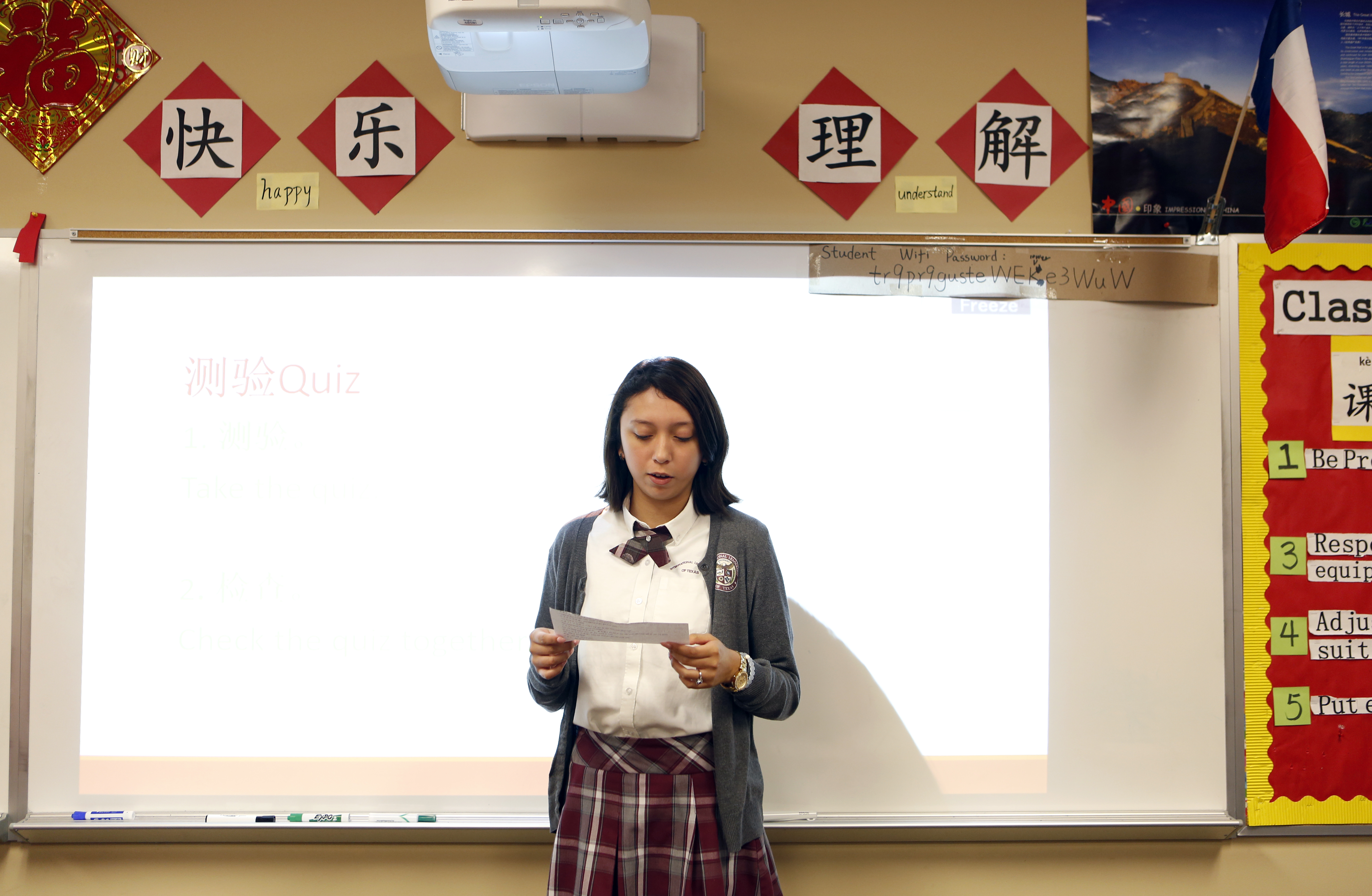 Alex Gutierrez speaks in front of other students in her Mandarin Chinese class at International Leadership of Texas in Garland. Photo/Lara Solt