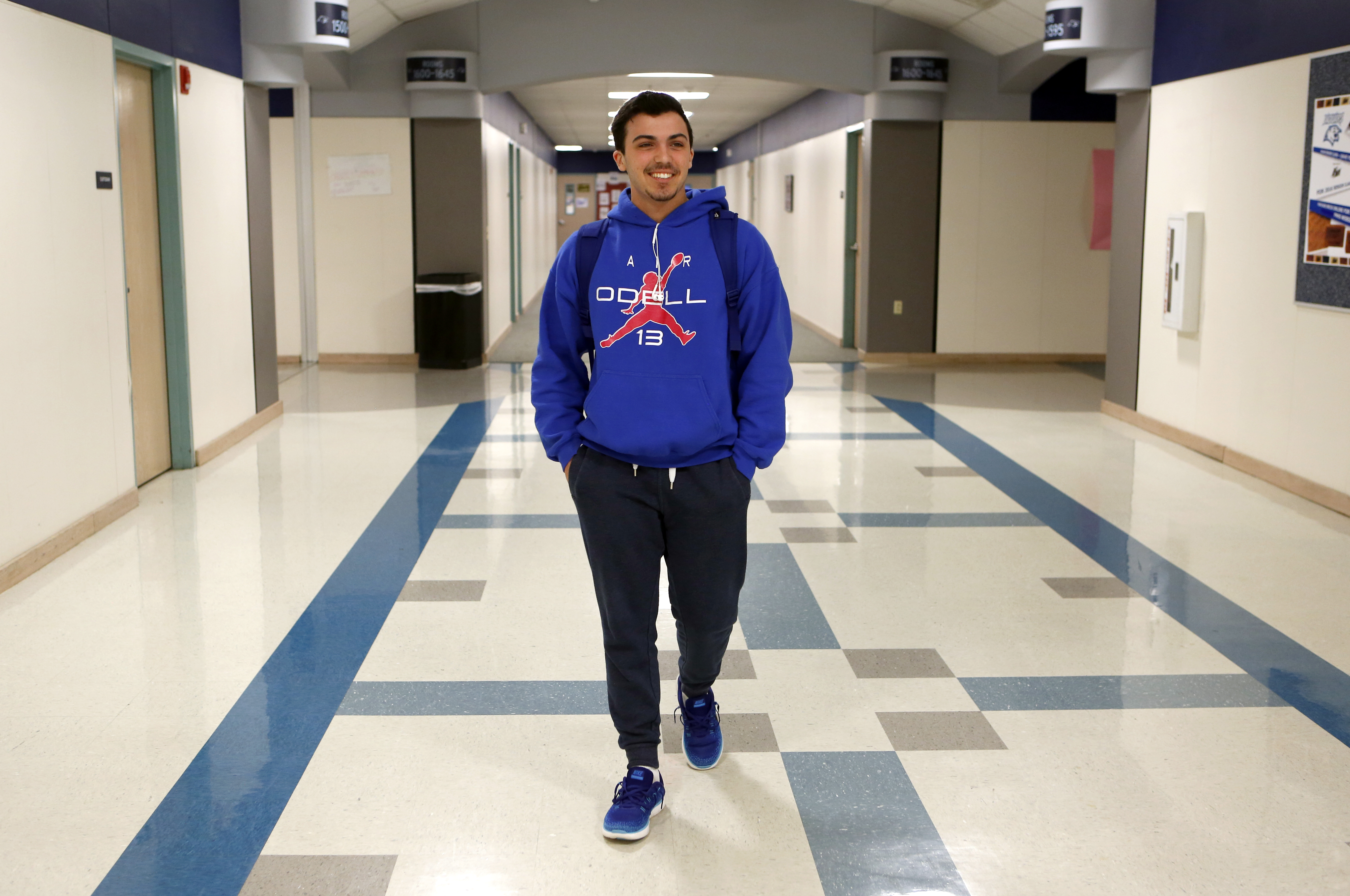 Ricky Rijos walks the hallways of Flower Mound High School. Photo/Lara Solt