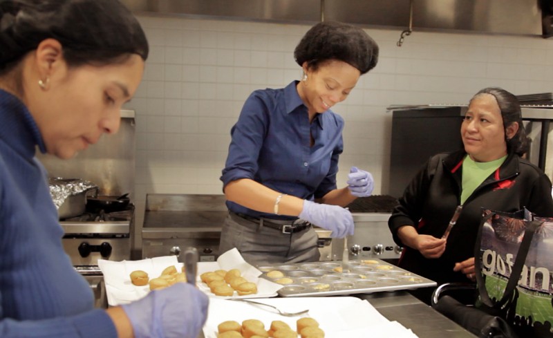 Workers prepare meals at the Jubilee Park Community Center. Photo/Thorne Anderson