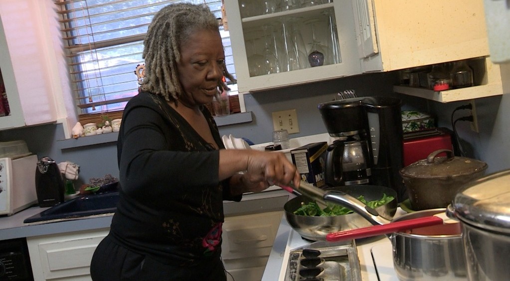 Shirley Martin cooking in her kitchen